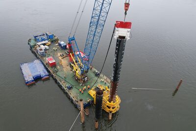 OMS Crane Hanging Vibro Hammer SVR 120 NF is Driving Tube Piles in Ukrain