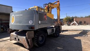 O&K MH 6 wheel excavator